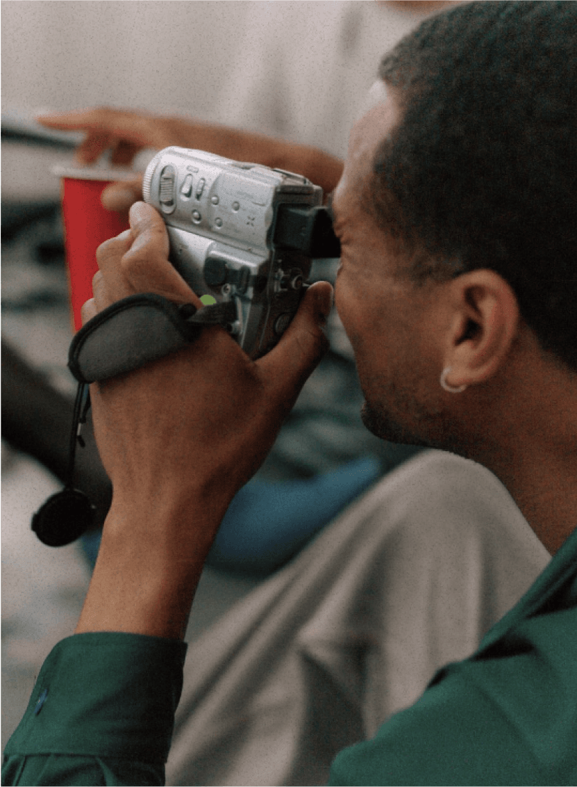 man using a camcorder